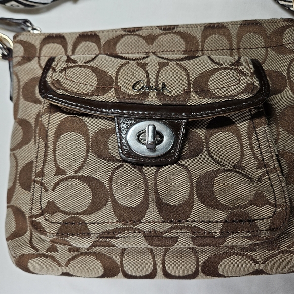 Coach Handbags - Reposhed Coach Tan and Brown Signature Swingpack Crossbody Bag